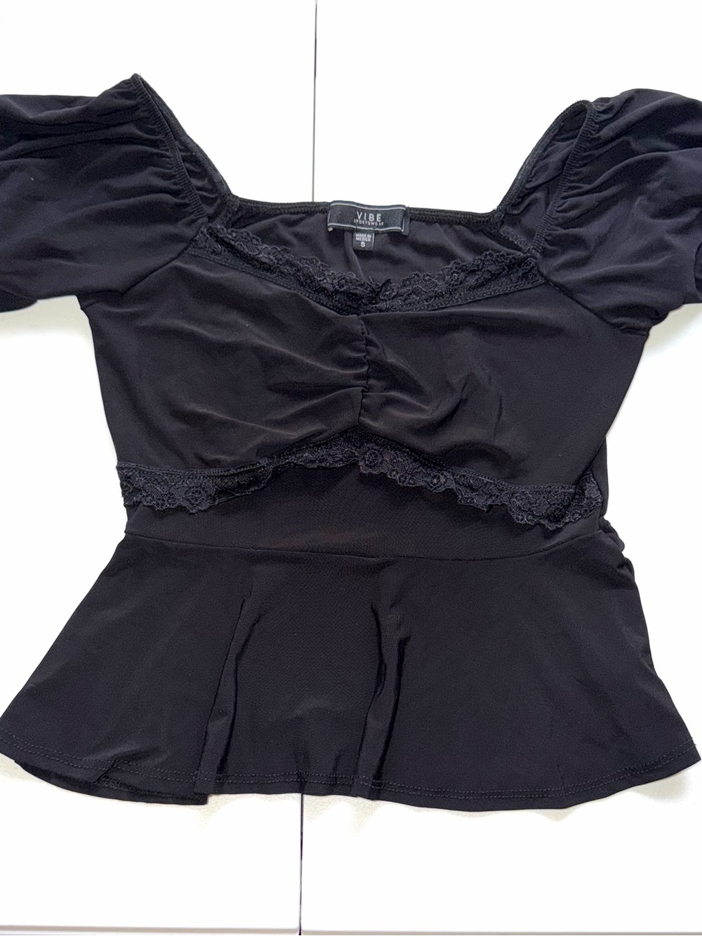 Black lace trim blouse with ruched detail and puffy sleeves in a S T0115